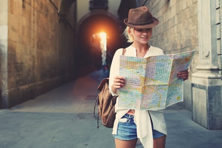 Traveler Reviewing Map